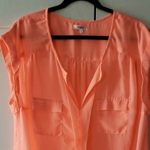 Sheer sleeveless cuffed blouse